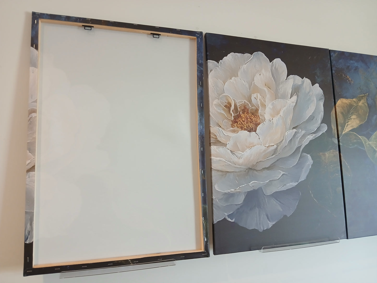White Floral Canvas Wall Art with Gold Accents on Deep Blue Background