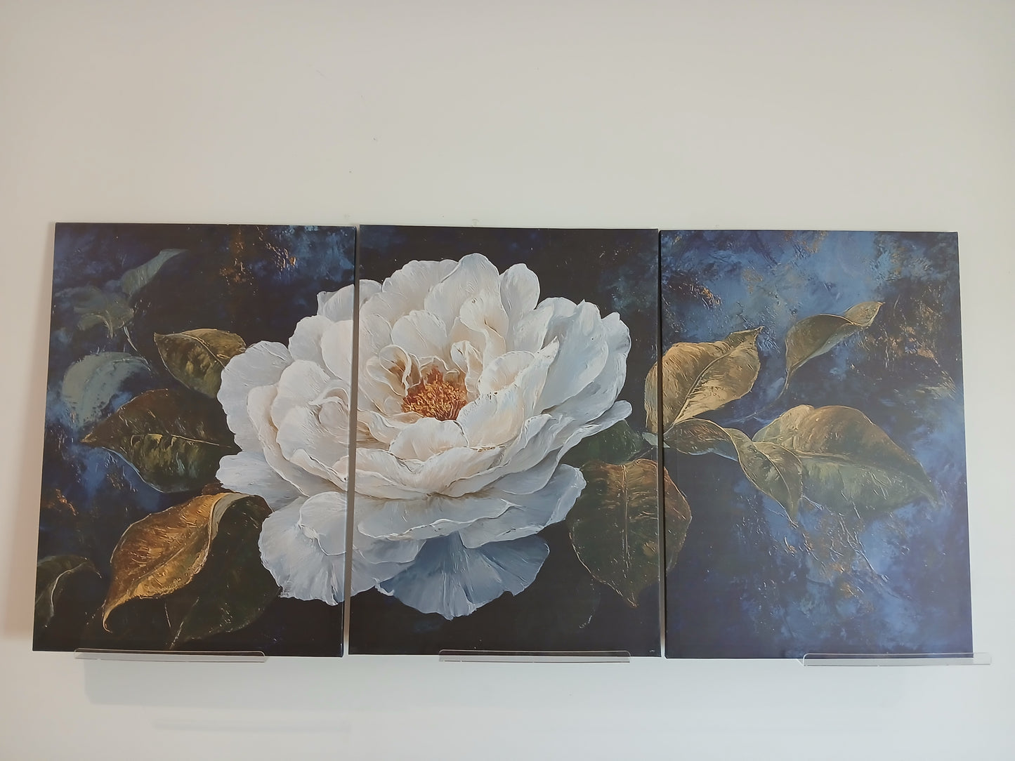 White Floral Canvas Wall Art with Gold Accents on Deep Blue Background