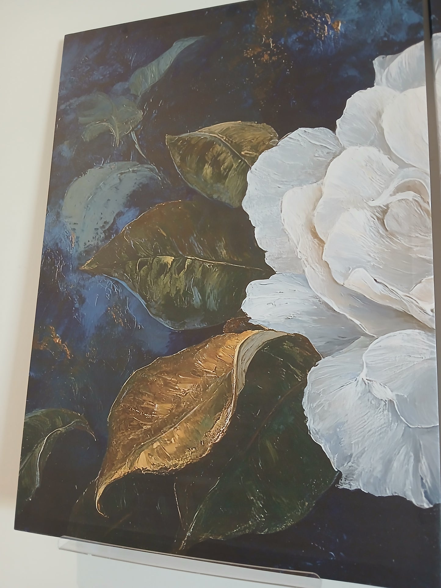 White Floral Canvas Wall Art with Gold Accents on Deep Blue Background