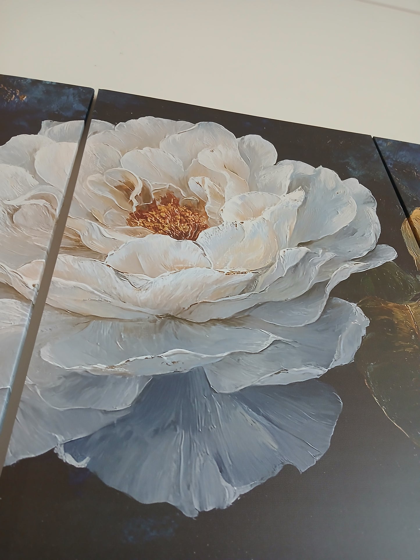 White Floral Canvas Wall Art with Gold Accents on Deep Blue Background